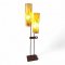 Stehlampe, Teakholzfuß eckig, zwei Röhrenschirme Kunststoff genähte Bastborte H50, aufkaschierte Trockengräser, Metallgestell schwarz, Mittelsteg Teakholz, H148x36, 2 flg. E27 max.60W