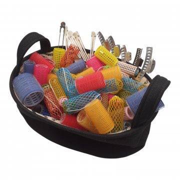 Korb mit Lockenwicklern und Haarklammern