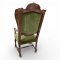 Ohrensessel, REN, geschnitzte Krönung, gedrehte Beine und Stege, grüner Veloursbezug, verzierte Nägel