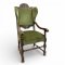 Ohrensessel, REN, geschnitzte Krönung, gedrehte Beine und Stege, grüner Veloursbezug, verzierte Nägel