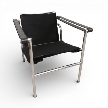 Armlehnstuhl Chromgestell, Sitz und Rücken Fell schwarz, Arml. Leder schwarz, Rücken schwenkbar